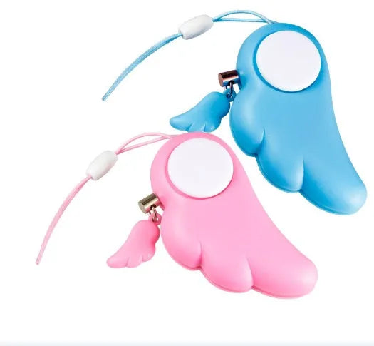 Blue compact personal security alarm clipped to a handbag, 6cm x 3cm, 90dB siren