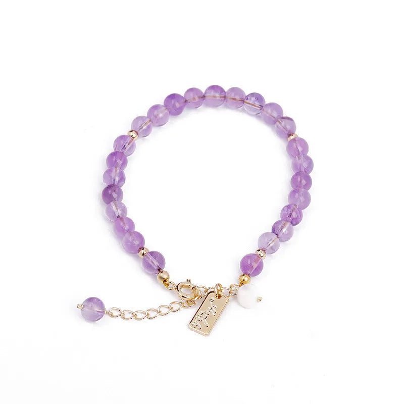 Natural crystal women's bracelet with lavender amethyst stones and animal/Zodiac motif in dark and light colour variations