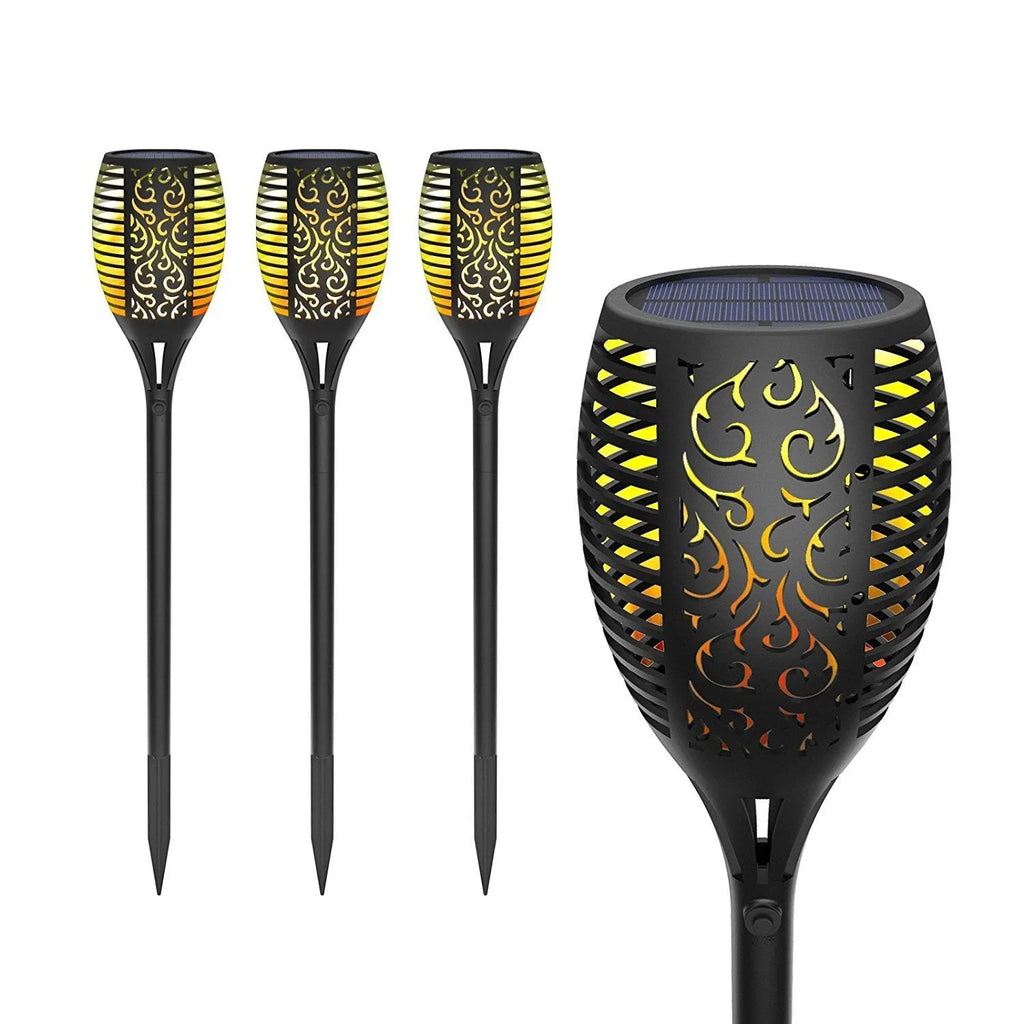 Black solar LED flame torch lamp with warm white flickering effect on a lawn, 83cm tall