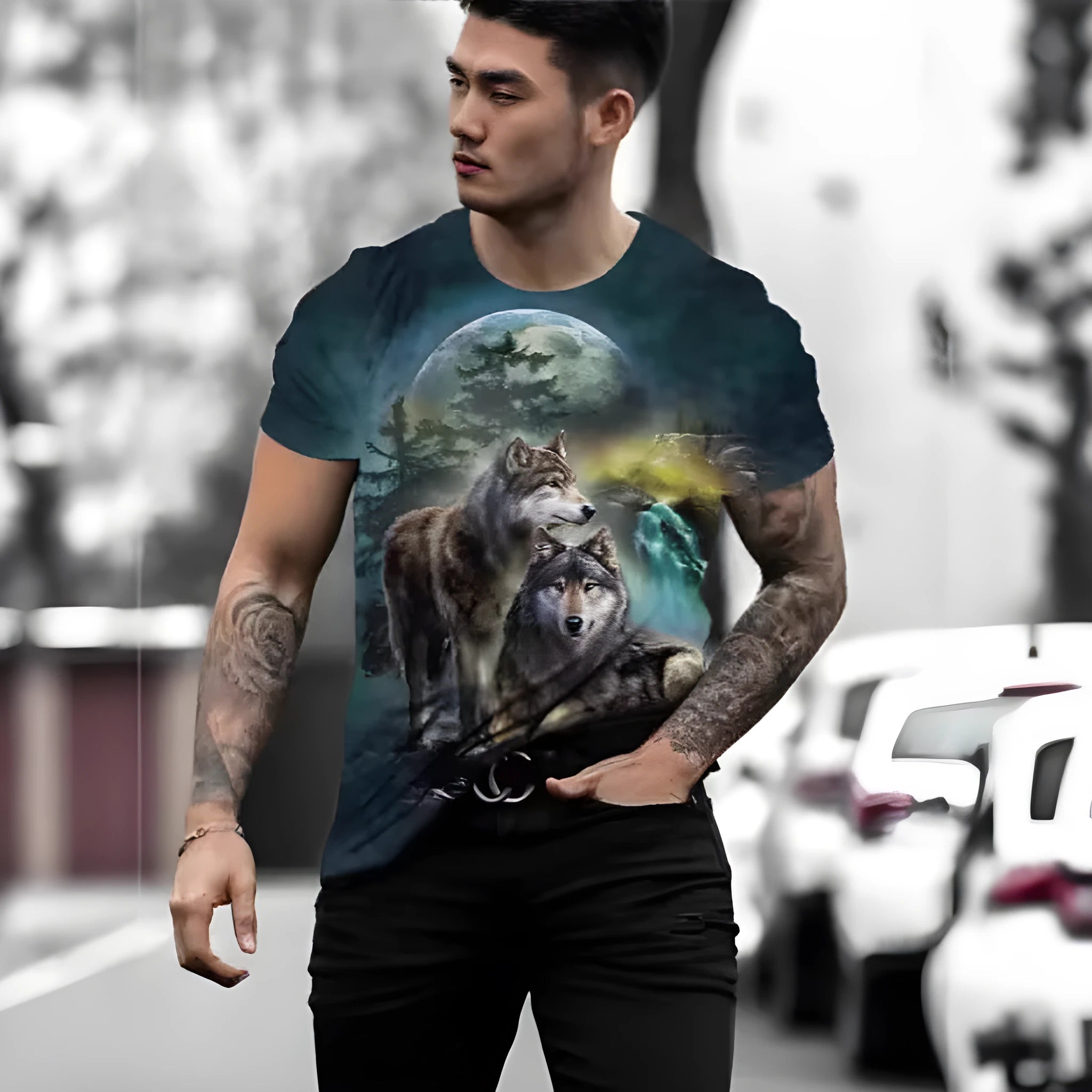 Man modelling a short-sleeved grey T-shirt with a retro-style 3D animal graphic print on the front.
