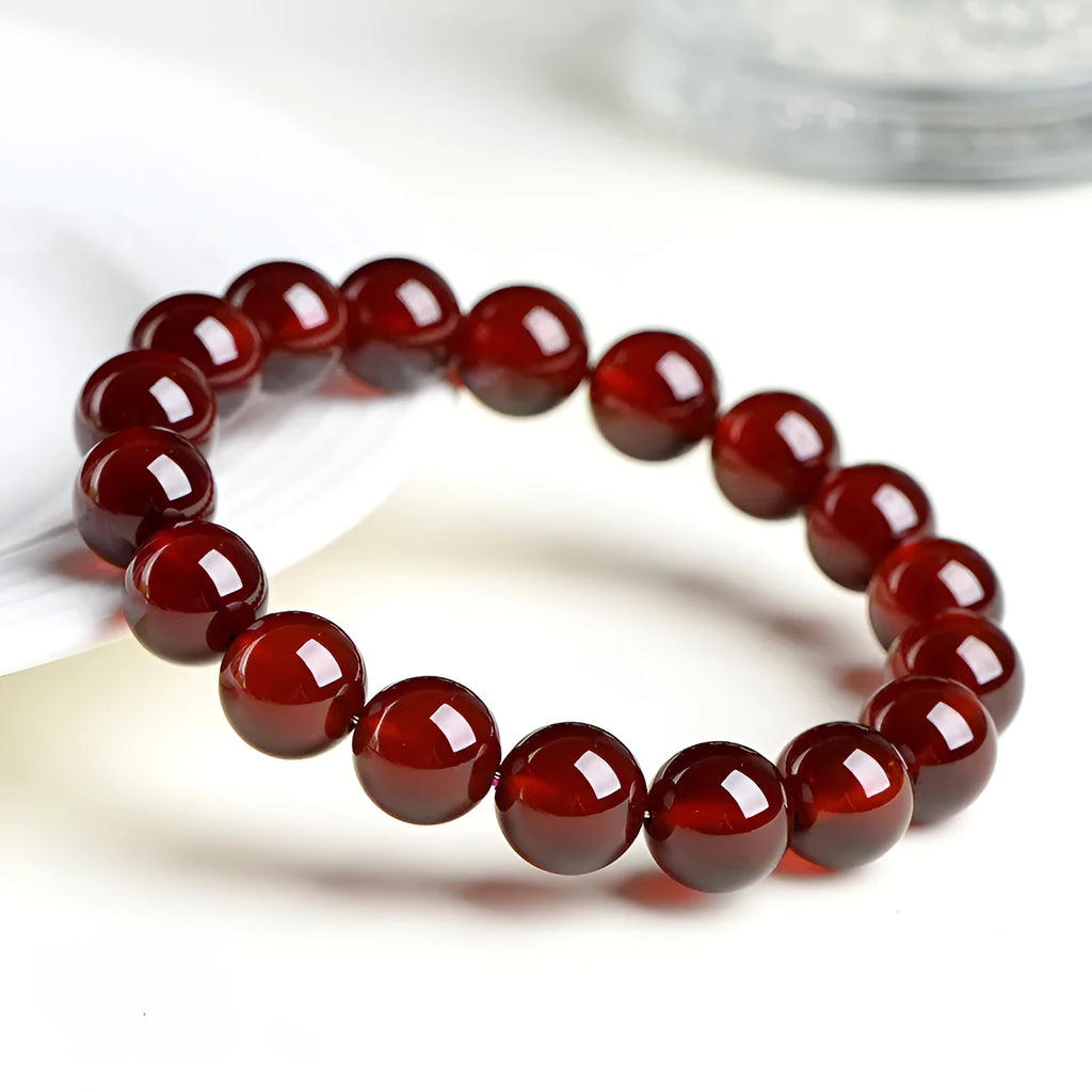 Natural orange red garnet crystal bracelet with ruyi motif in retro unisex design