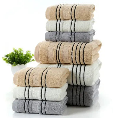 Pure cotton bath towel set with one large towel and two hand towels in neutral colours.