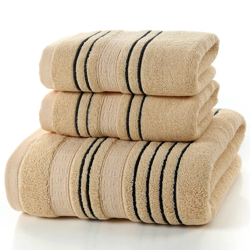 Pure cotton bath towel set with one large towel and two hand towels in neutral colours.