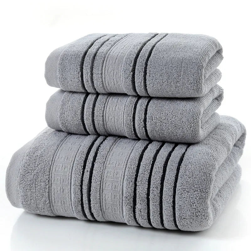 Pure cotton bath towel set with one large towel and two hand towels in neutral colours.