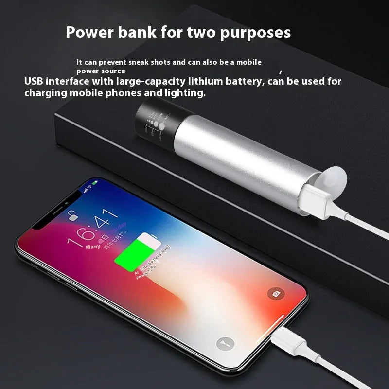Handheld black aluminium red light mosquito repellent lamp with USB charging cable.
