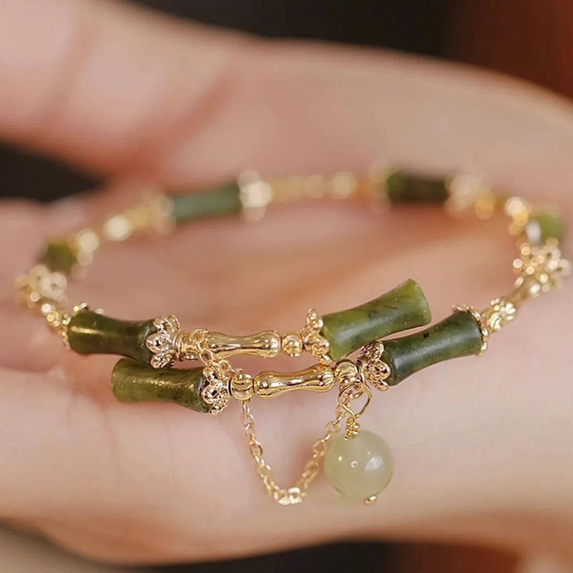 Women's bamboo bracelet with plum wine bamboo joints and coloured glaze beads on adjustable elastic cord