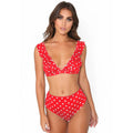 Black and white polka dot print bikini set with deep V-neck top and ruffled design