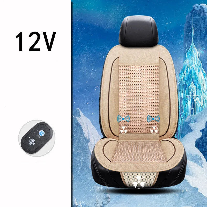 Black car ventilation seat cushion with power cord, shown on a car seat