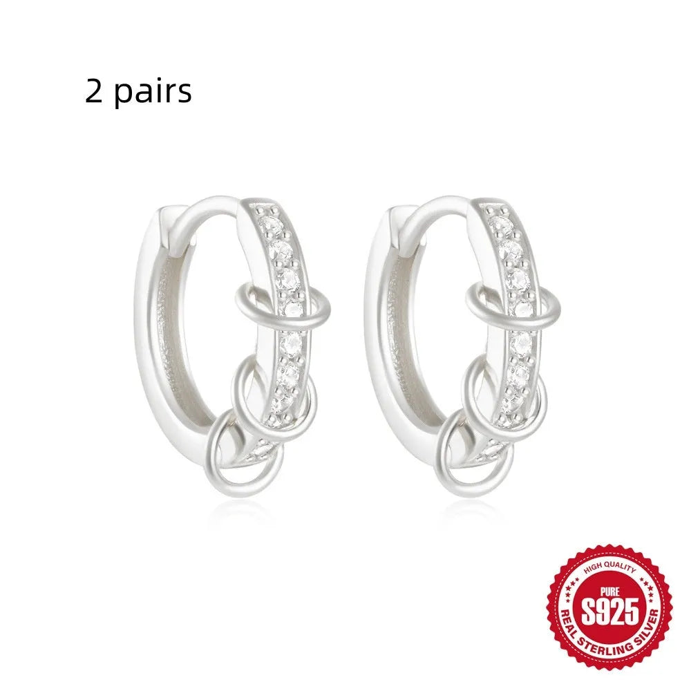 Small round geometric sterling silver stud earrings with diamond accents in gold or silver finish