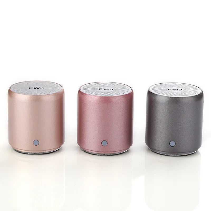 Mini wireless Bluetooth speaker in grey with compact body, 600mAh battery, and 10m Bluetooth range