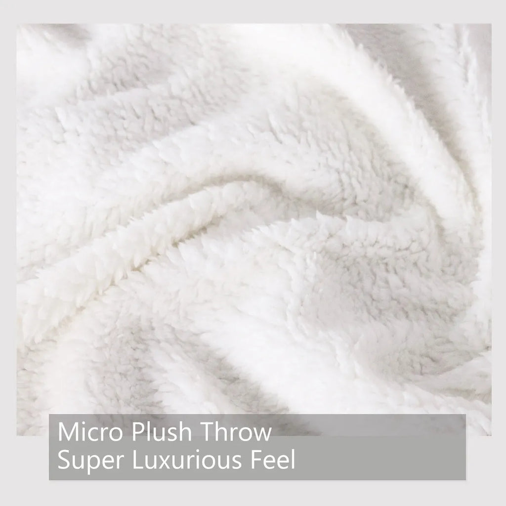 Brown sherpa fleece blanket 150x200cm on a couch, soft and warm for home use