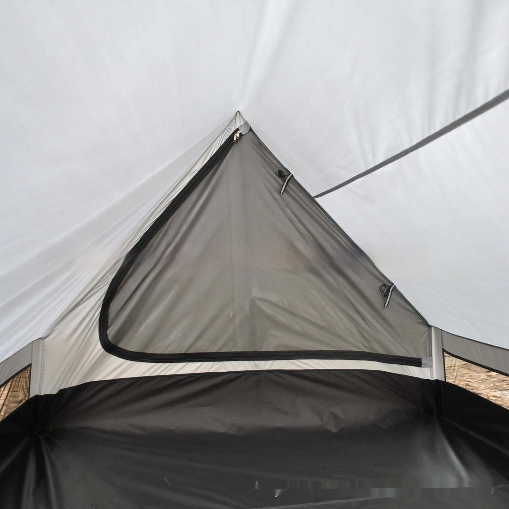 Brown A-line tent for 2-3 people with PU4000 waterproof fabric, 210x150x110cm, set in a grassy campsite.