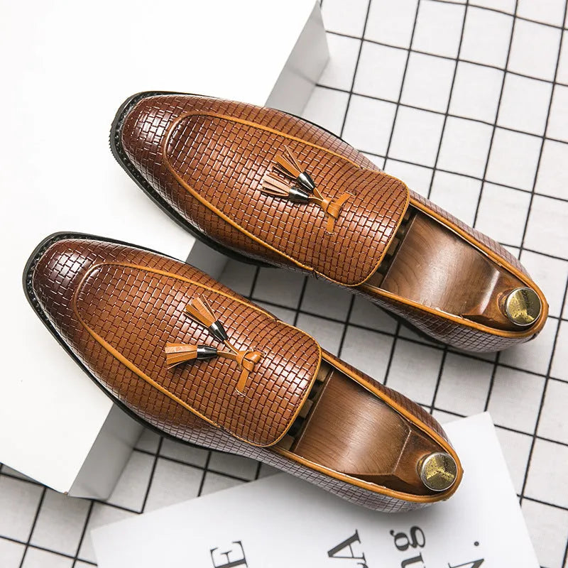 Men's black slip on loafers with pointed toe and tassel detail on PU leather upper