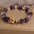 Purple crystal women's bracelet with pumpkin, wind chime, and lucky bead design featuring rhinestone details