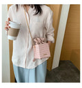 One shoulder messenger bag for women in PU leather, bucket shape with chain strap, available in multiple colours