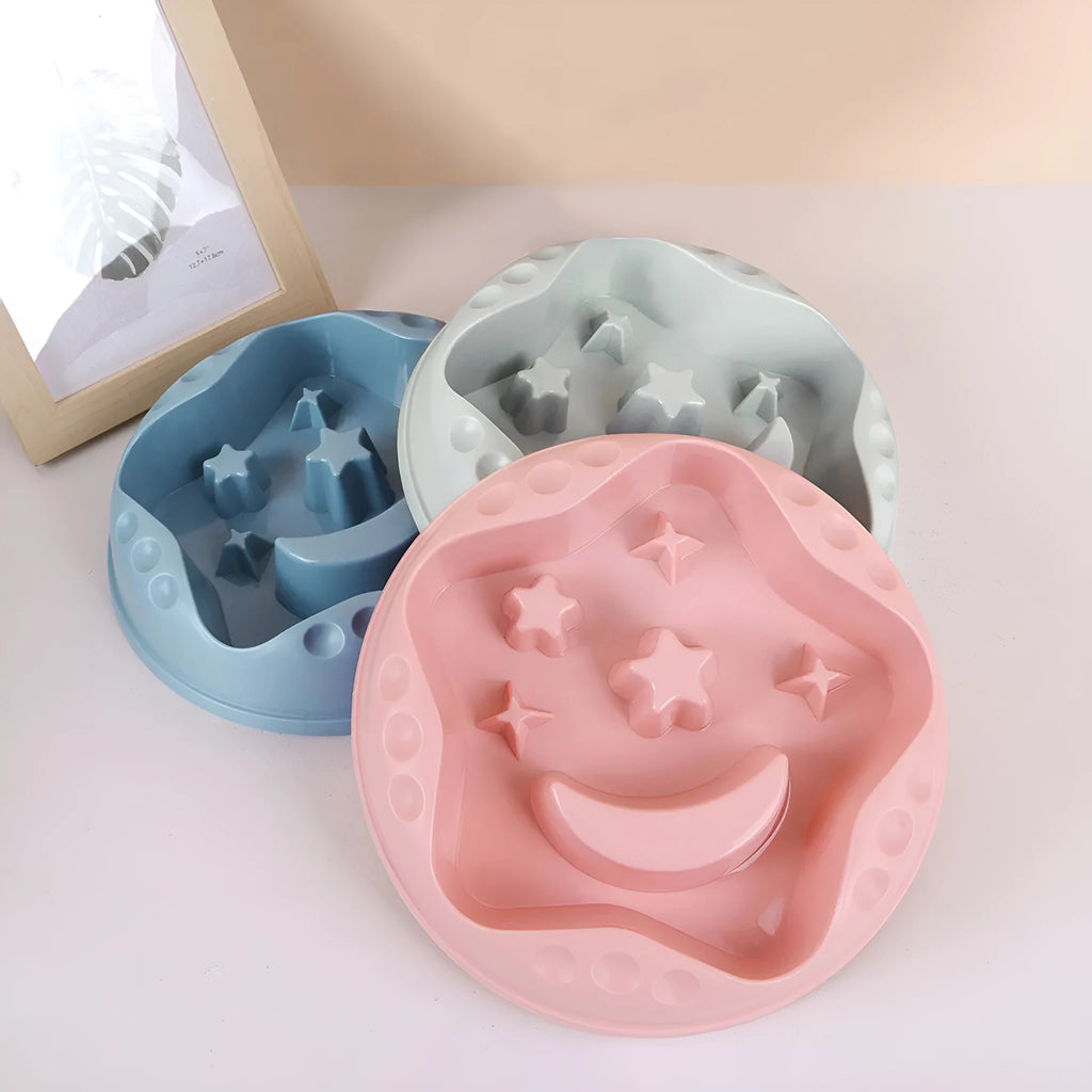 Large pet slow feeder bowl with moon and star obstacles inside, shown in blue colour.