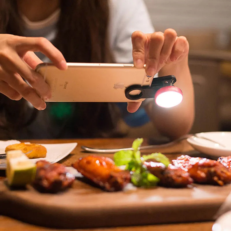 Mobile phone wide-angle camera lens with LED lights in black, red and silver grey