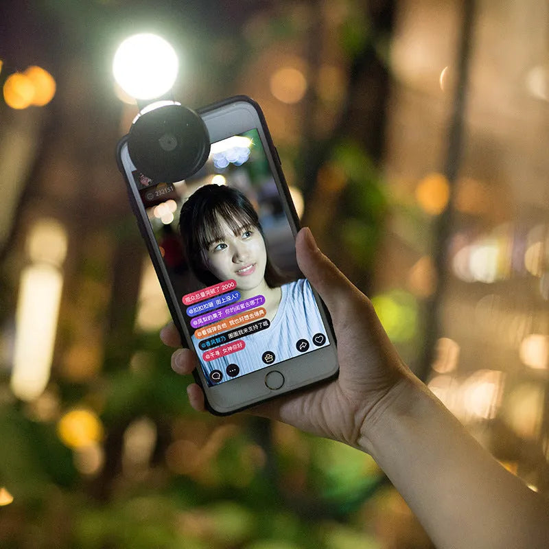 Mobile phone wide-angle camera lens with LED lights in black, red and silver grey