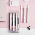 Six black Creative Sakura gel pens with pull-out mechanisms and 0.5mm needle tips.