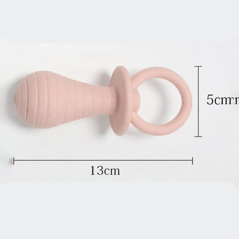 Four coloured pet pacifier rubber chew toys with squeakers for puppies and kittens
