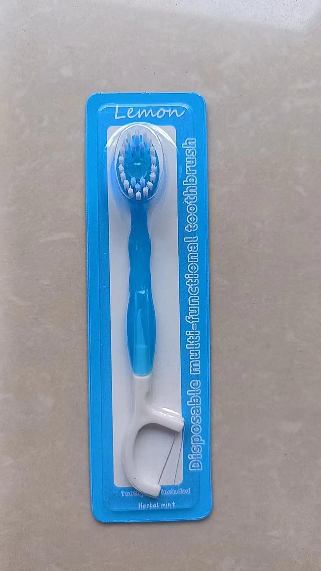Exploding bead disposable mini toothbrush with toothpaste beads in four flavours for travel