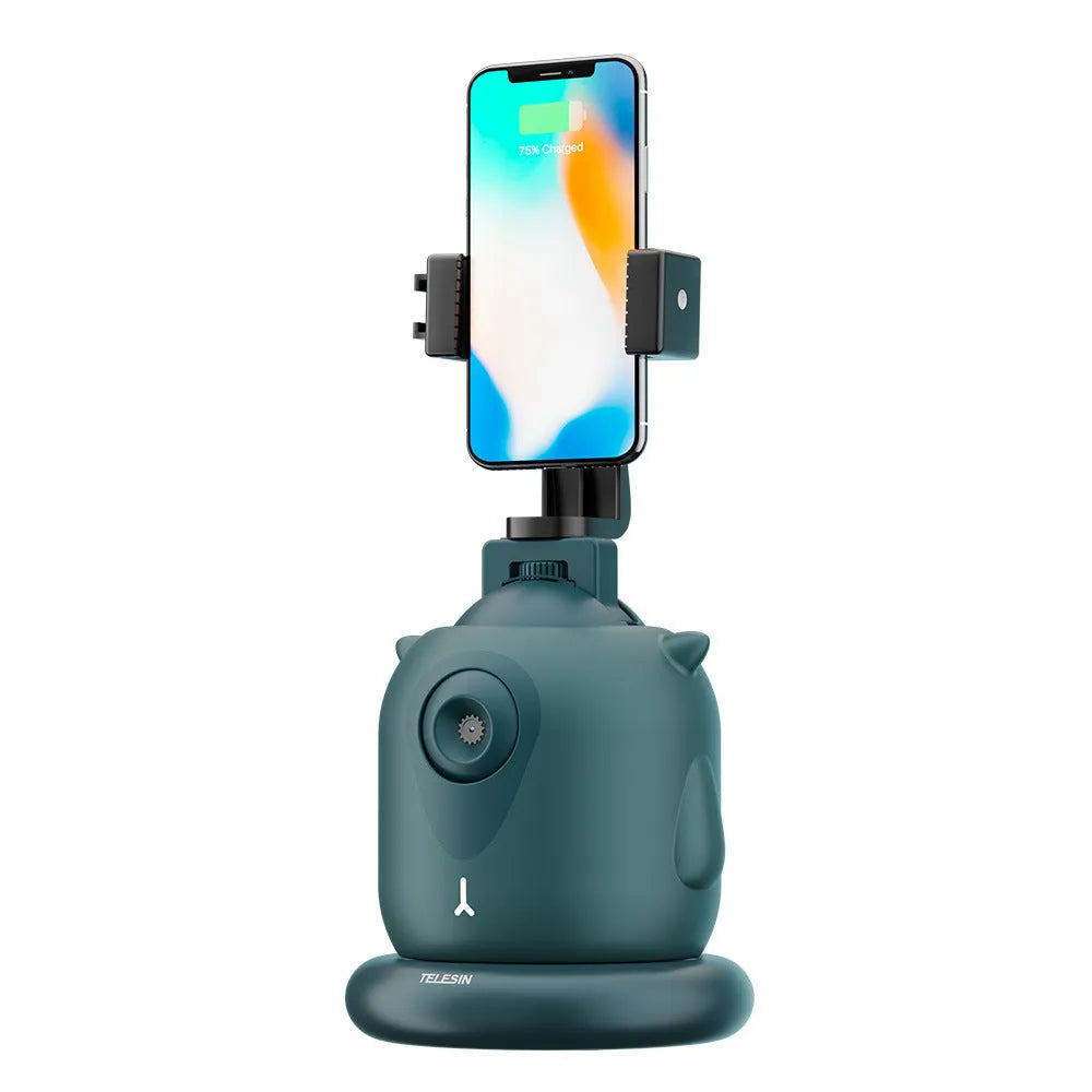 Dark green intelligent gimbal with AI face tracking and 360-degree rotation on a tripod.