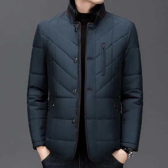 Men's dark blue short winter padded coat with side pockets on a mannequin