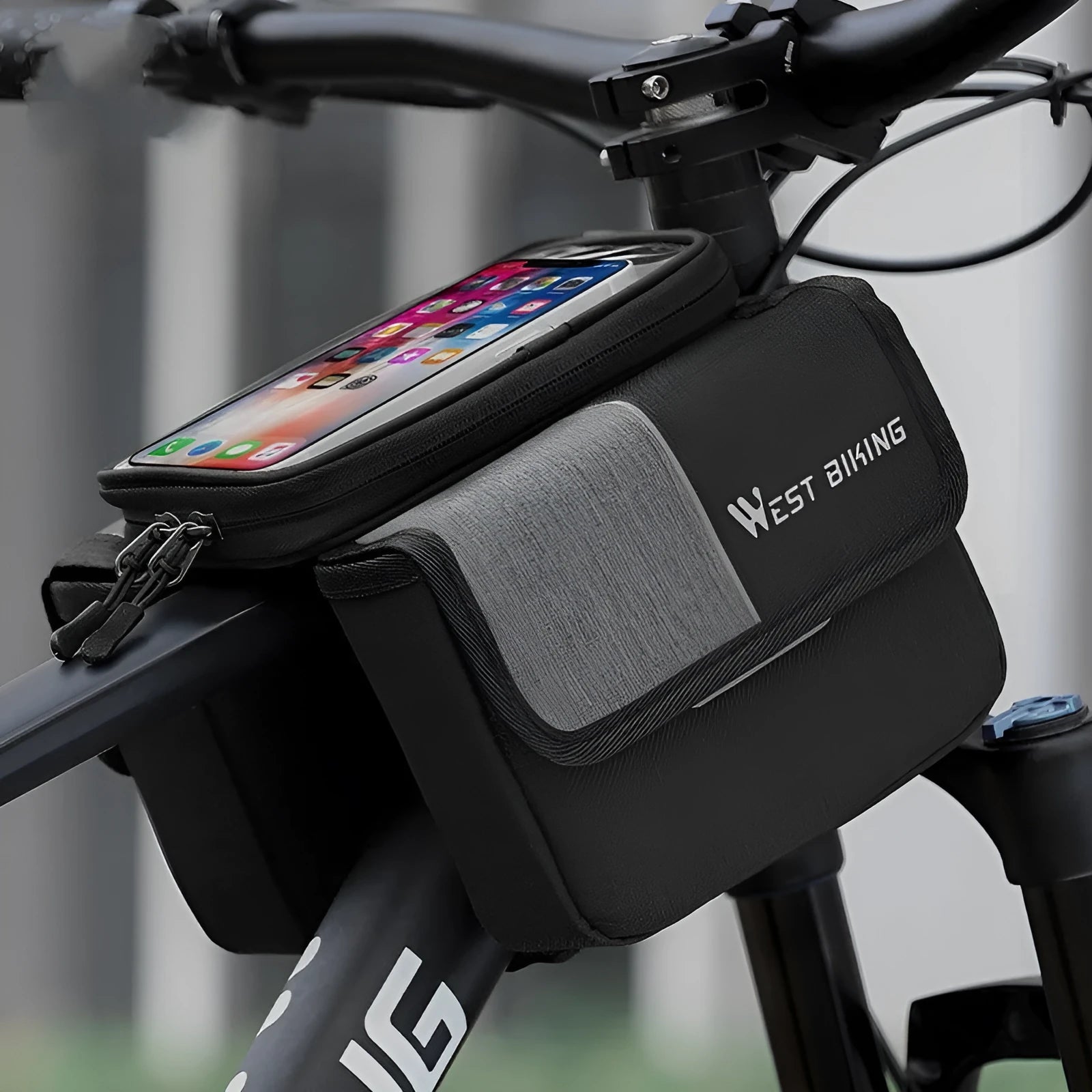 Black and grey Oxford cloth bilateral tube saddle bag mounted on bicycle handlebars.