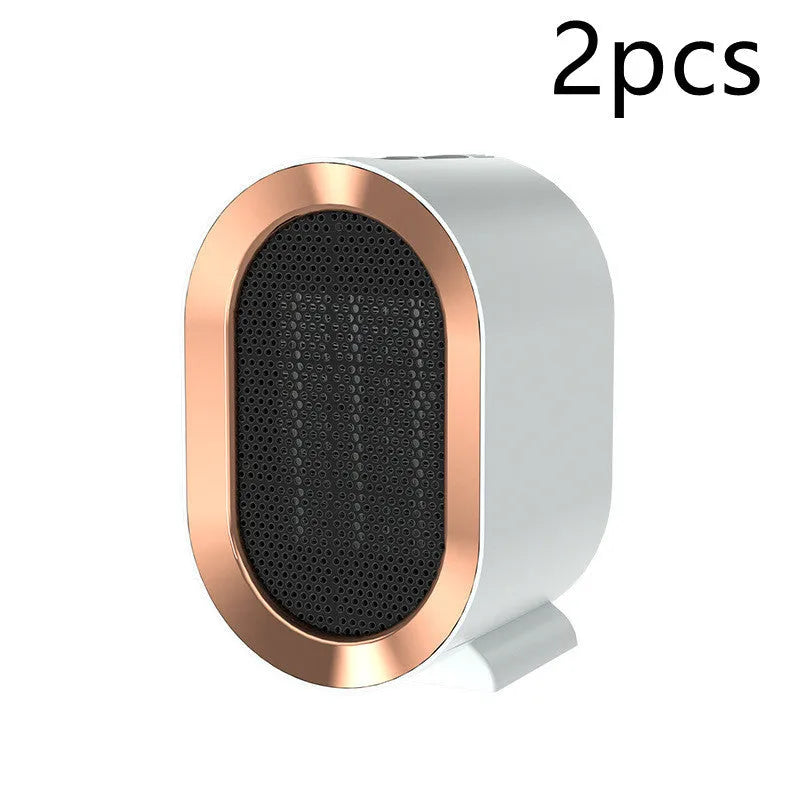 Black desktop electric heater with ceramic heating element and mechanical controls for two-speed operation