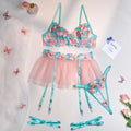 Pink women's mesh pettiskirt suit with matching embroidered bikini set on polyester fabric