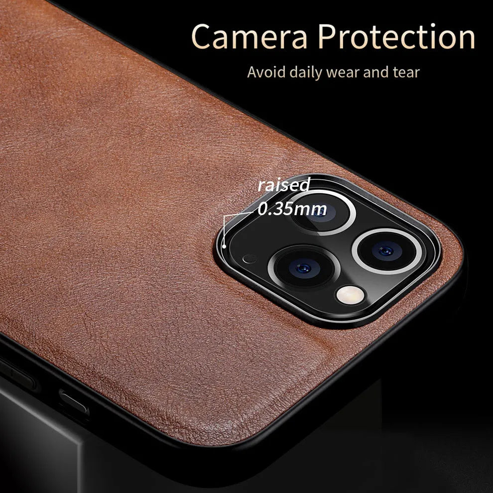 Black PU leather iPhone 12 phone case with soft TPU sides on a wooden table.