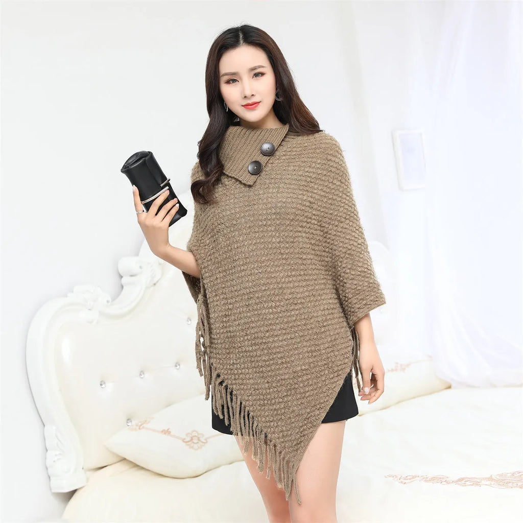 Women's knitted polka dot shawl cloak in sleeveless cape design showing colour options