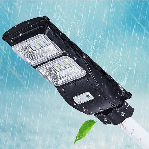 Integrated solar street light with solar panel, 60W LED lighting, and remote control for outdoor use