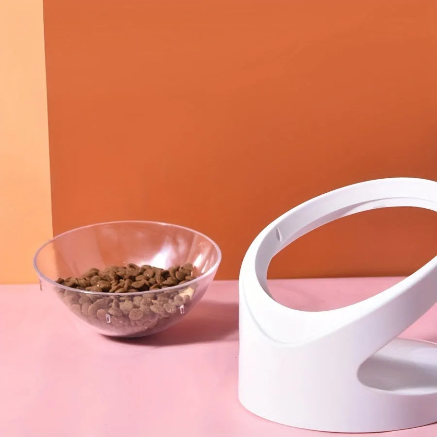White elevated cat food bowl with clear plastic construction and anti-vomit tilt design