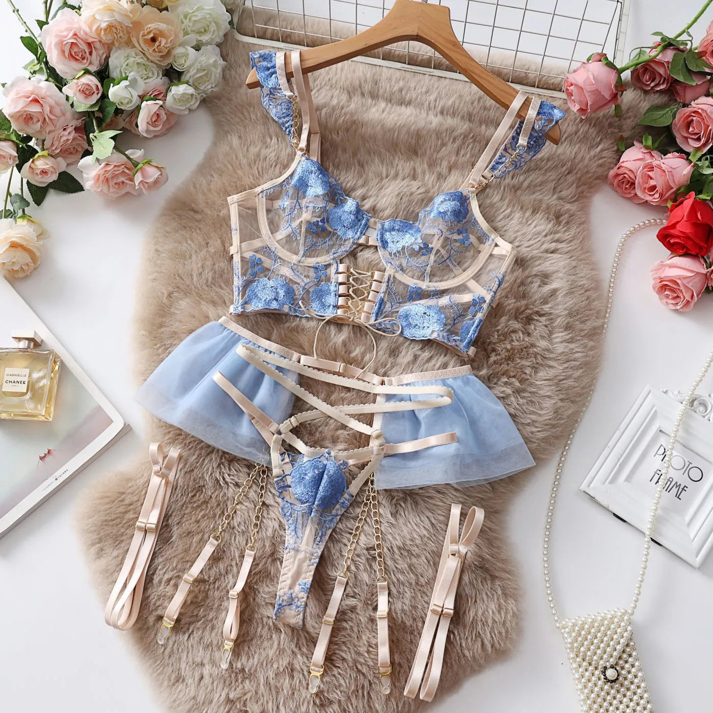Light blue lace push up bra set with matching mesh underwear on hanger
