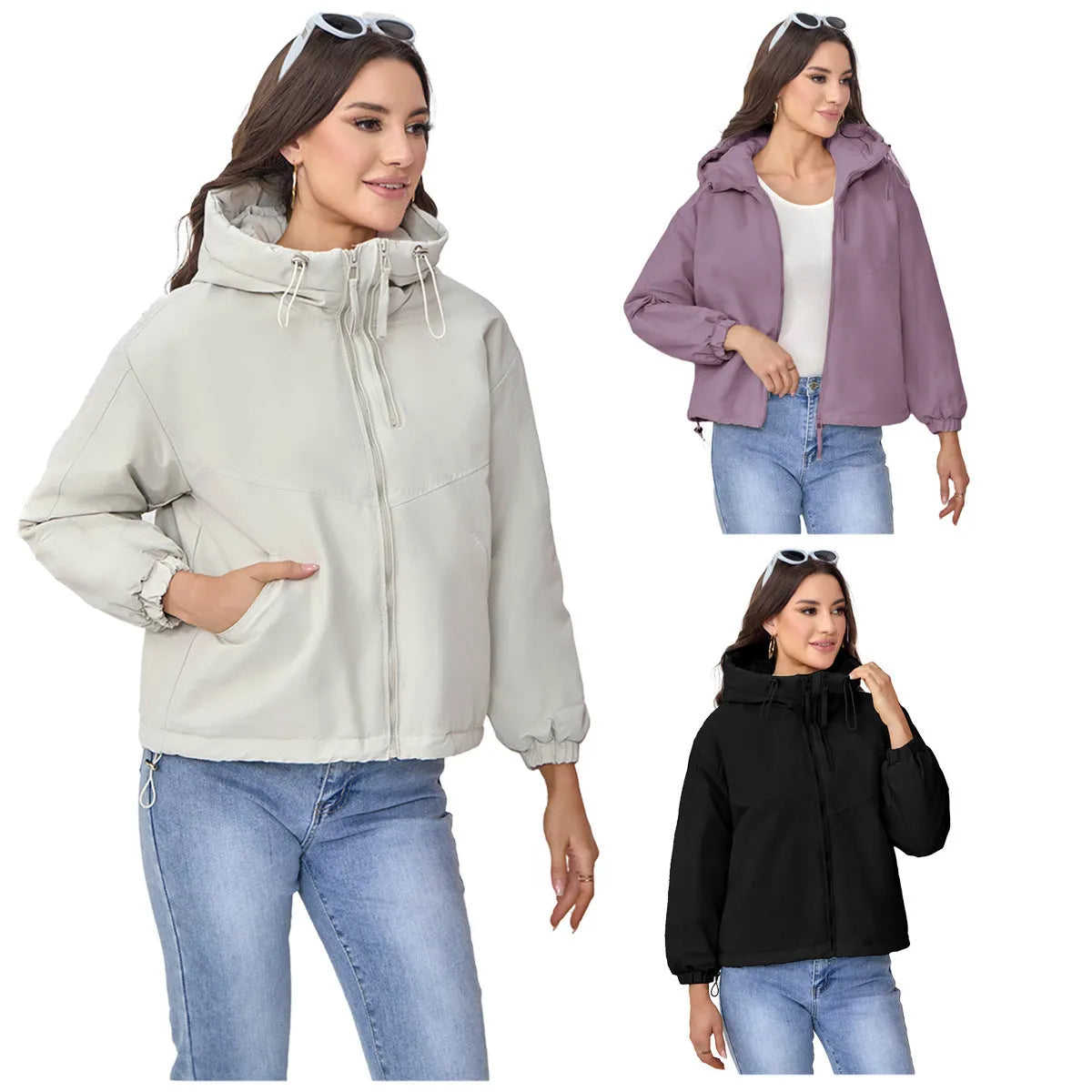 Women's grey loose-fit hooded polyester shell jacket with long sleeves.