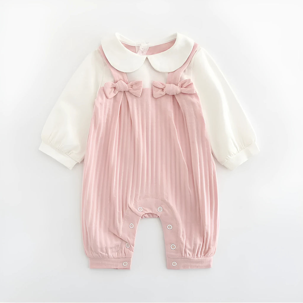 Pink long sleeve cotton baby jumpsuit with single-breasted front closure for a girl.