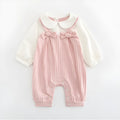 Pink long sleeve cotton baby jumpsuit with single-breasted front closure for a girl.