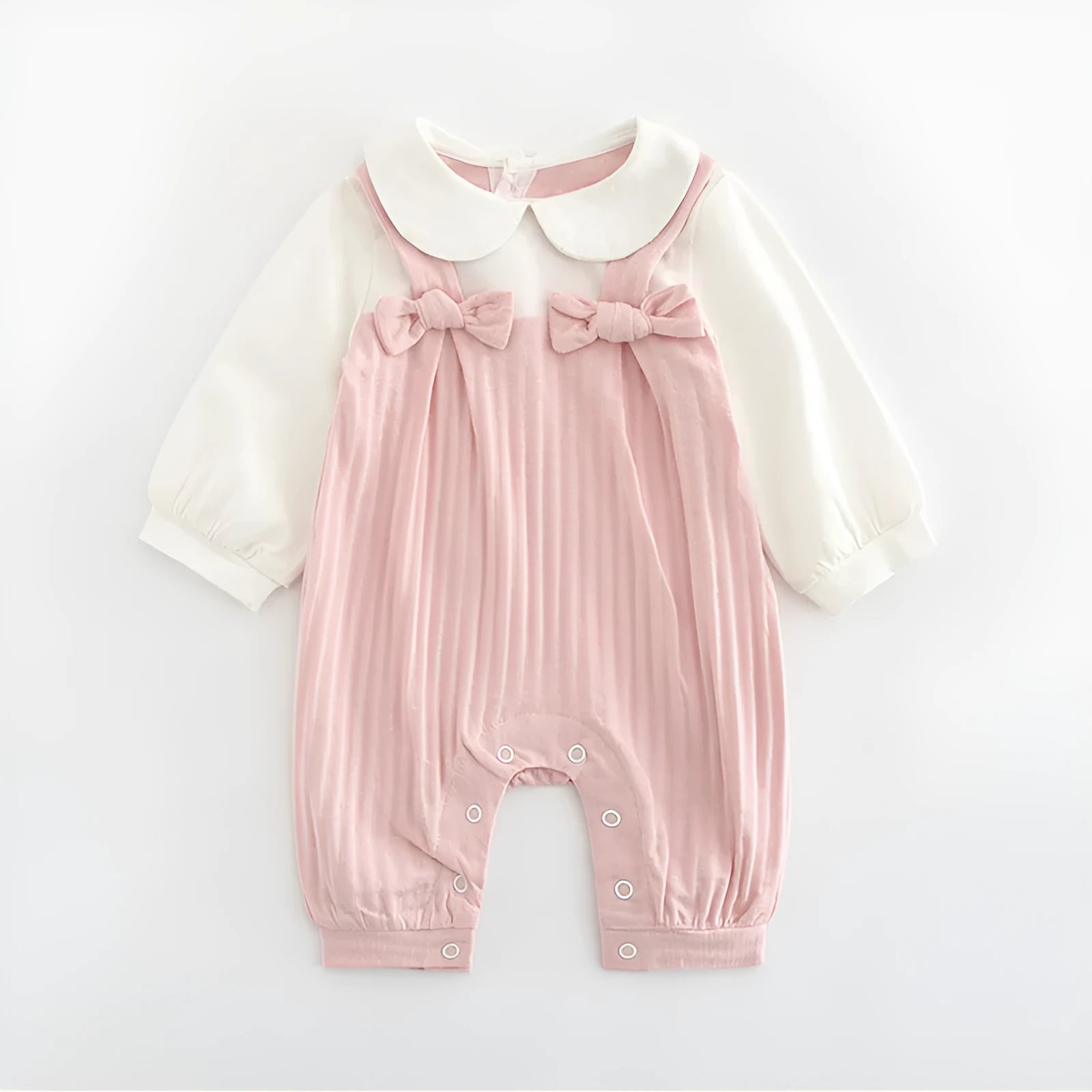 Pink long sleeve cotton baby jumpsuit with single-breasted front closure for a girl.