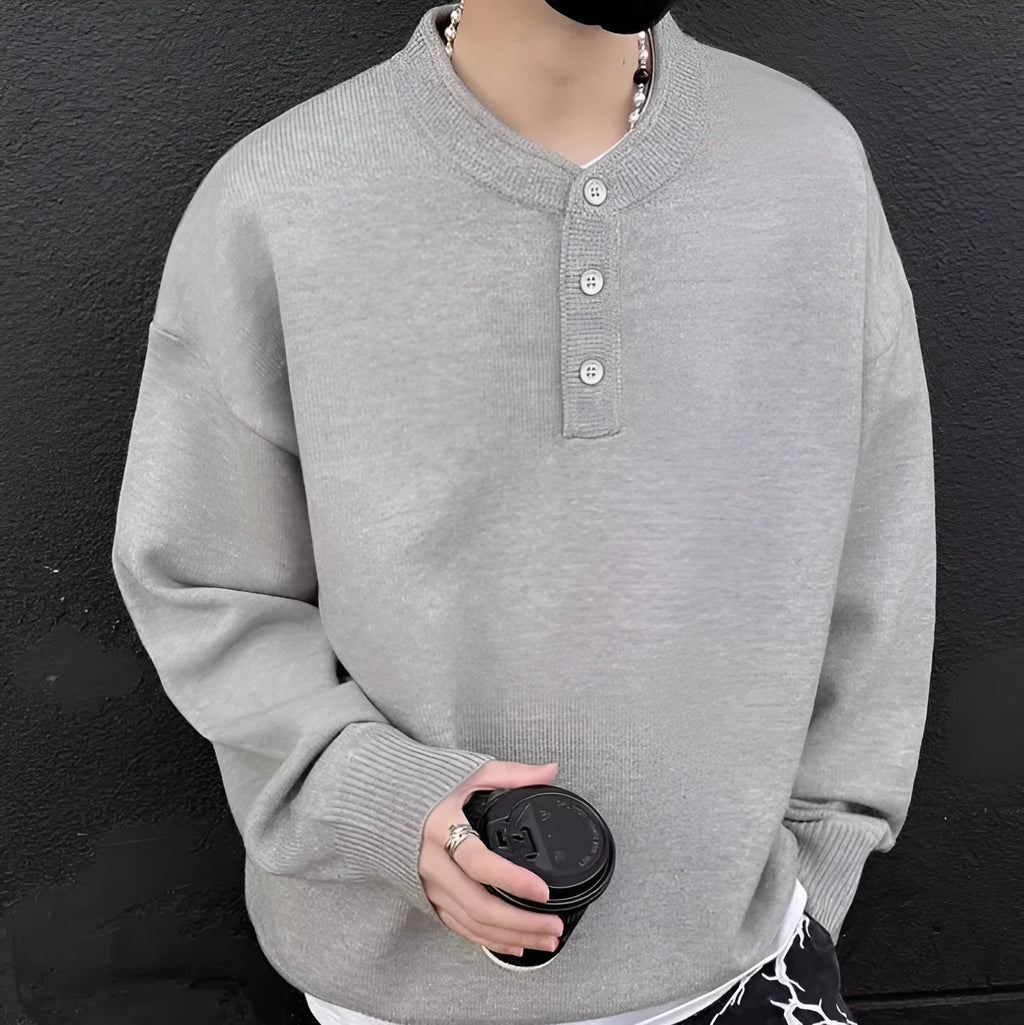 Men's loose long sleeve knit sweater in black, front view, casual pullover style