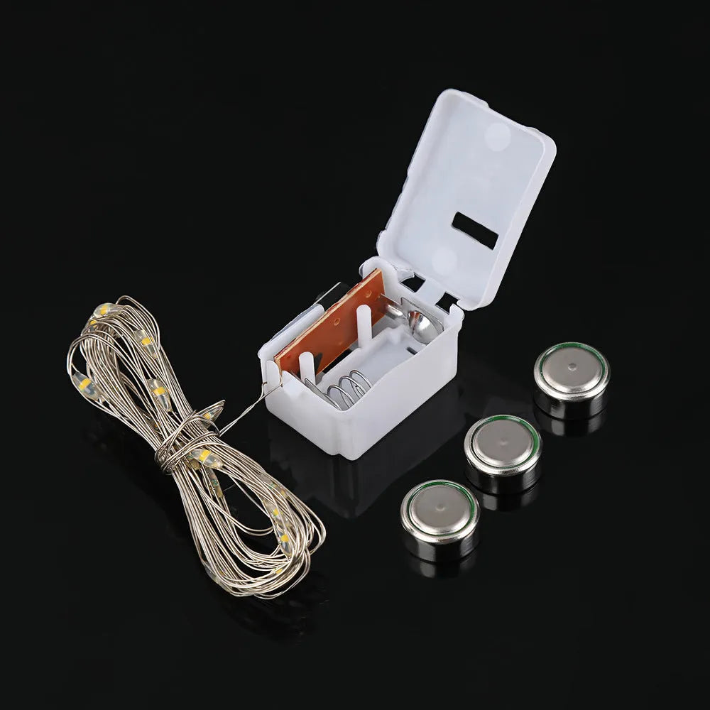 2m LED copper wire string lights in small white box with button battery power three gear colour modes