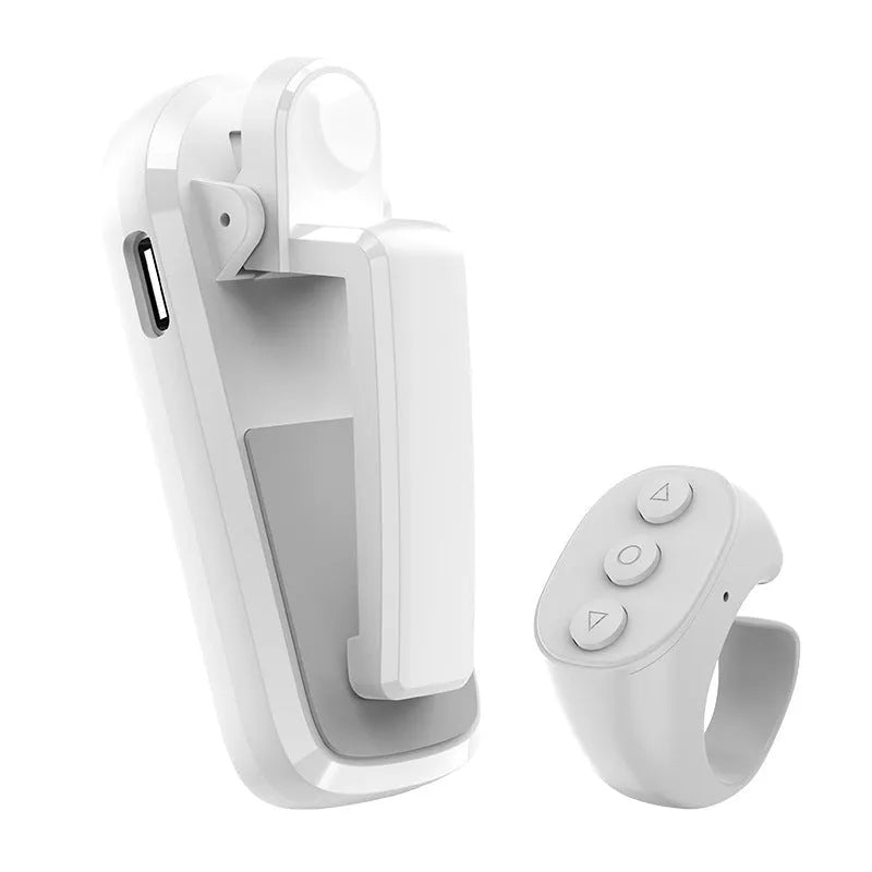 Smart wireless page turner remote with finger clicker for Kindle tablets and phones in black pink or white.