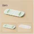 Colourful ice cube tray set with high-capacity grid and integrated storage for ice shovel