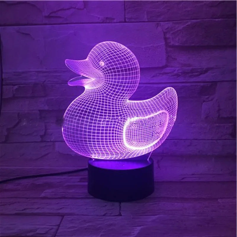 Little yellow duck 3D acrylic night light with colour-changing LED and remote control on table