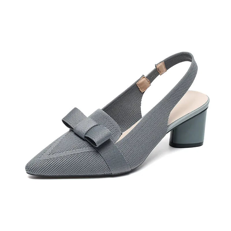 Women's closed toe high heel sandals with an ankle back strap in a pointed toe design on a rubber sole