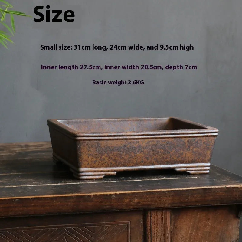 Large and small rectangular purple sand bonsai pot with firewood-burning texture for pine trees.