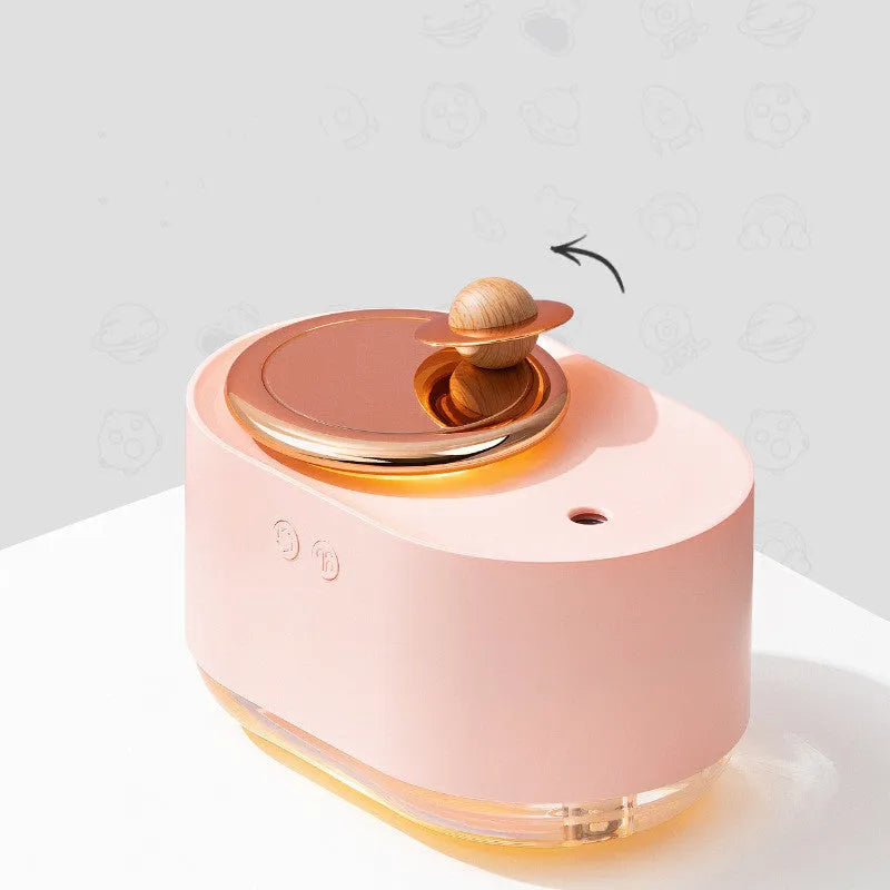 Rotating planet USB humidifier with night light in green, pink, or white colours