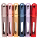 12ml aluminium portable perfume bottle in bullet shape with choice of six colours: blue, pink, red, violet, gold, silver.