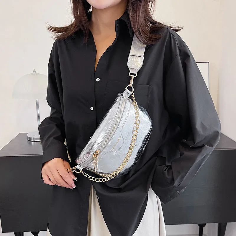 Shiny PU leather chest bag with WesternWide shoulder strap and chain detail, available in multiple colours