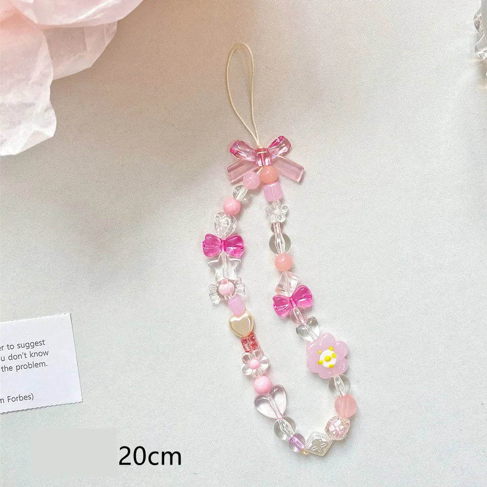 Colourful beaded flower mobile phone lanyard on rope with blue, pink, and yellow options
